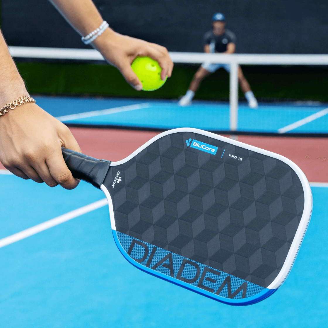 Diadem Edge BluCore Pro Pickleball Paddle in hand