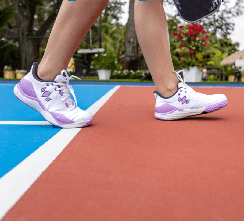 Pickleball players on court wearing diadem court burst pickleball shoes