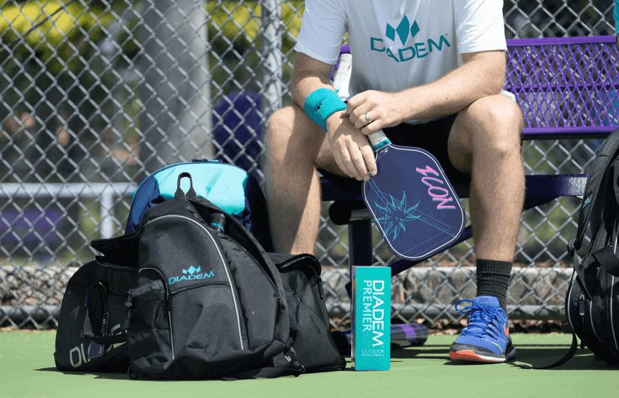 Pickleball player with Diadem Icon paddle and accessories