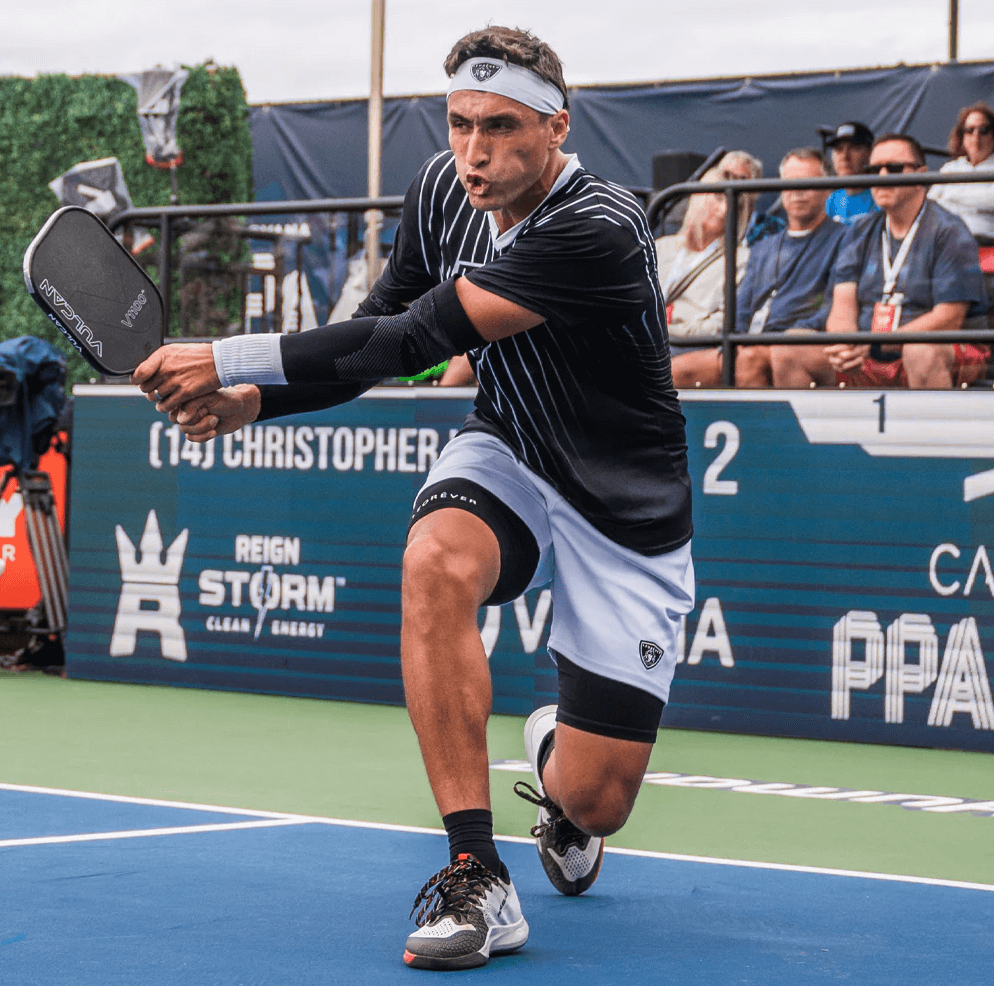 Player hitting with Vulcan V1100 JD Pickleball Paddle