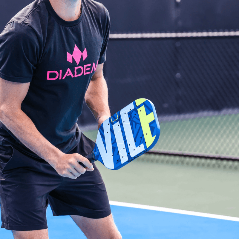 Pickleball Player holding Diadem VICE Concept Paddle